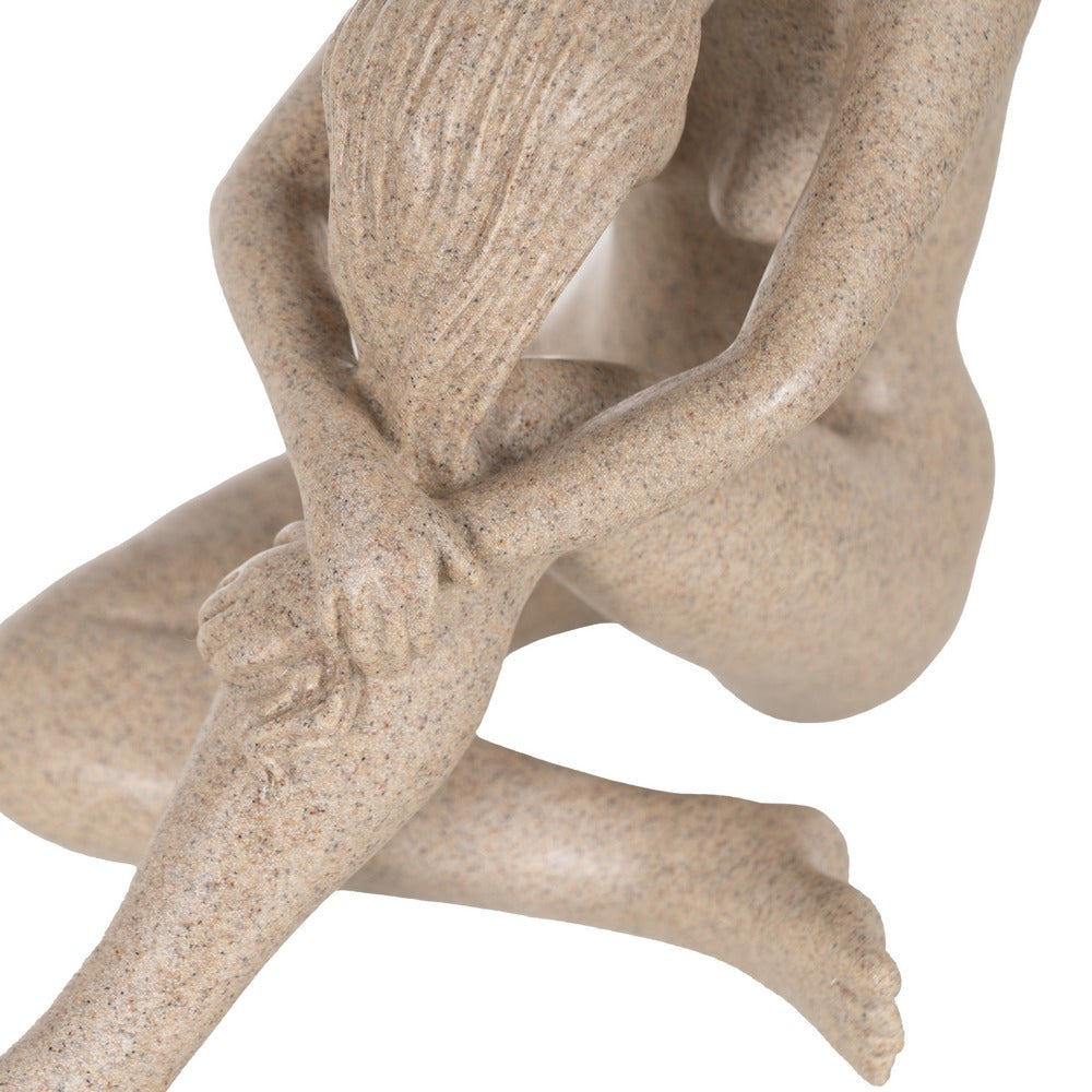 NAKED FIGURE POLYRESIN DECORATION 28.50 X 17.50 X 18 CM
